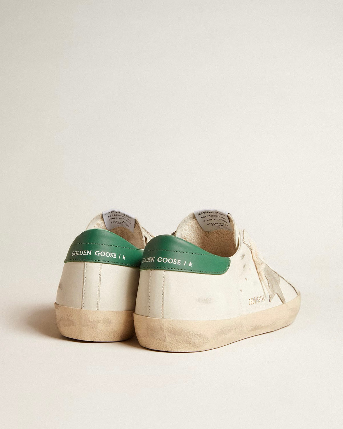 Super-Star in white leather with ice-gray suede star and green leather heel tab